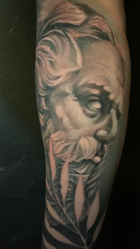 Explore religious chest tattoo ideas, creative tattoo ideas in Lemoyne, available at Ego Ink Tattoo & Body Piercing Shop