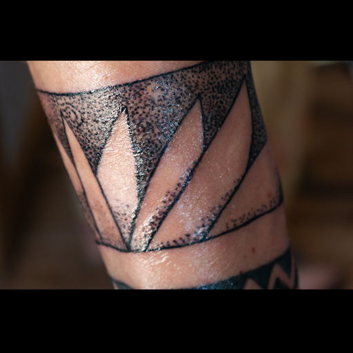 Explore haunted mansion tattoo ideas, creative tattoo ideas in Bainbridge Island, available at Ryderville Ink Tattoos & Fine Art