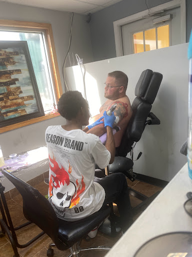 Explore tattoo ideas for men about family, creative tattoo ideas in Fort Wayne, available at Grade A Tattoos and Body Piercing