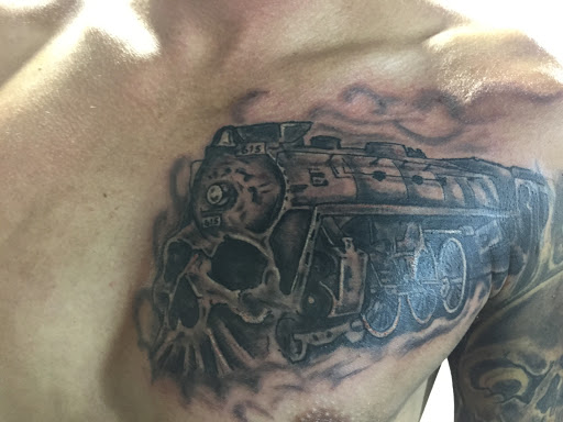 Explore half sleeve flower tattoo ideas, creative tattoo ideas in Madison, available at ART IMMORTAL TATTOO