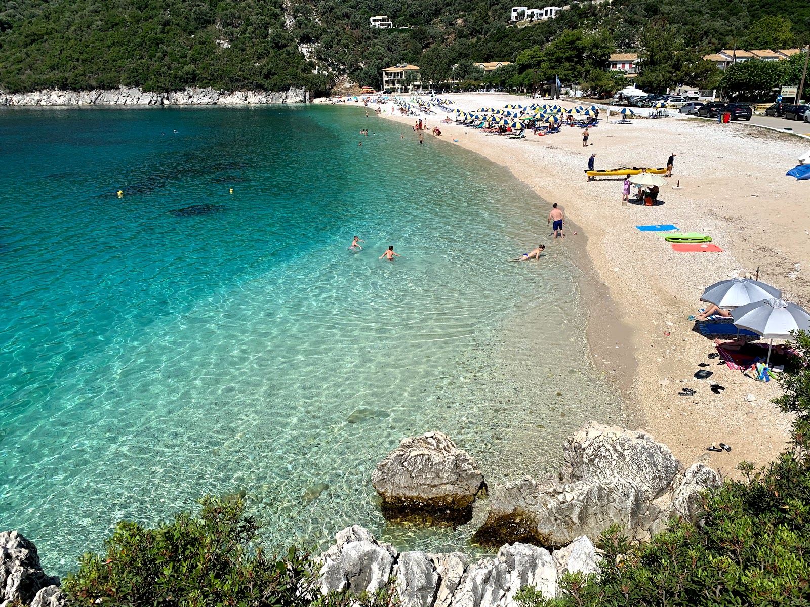 Photo of Mikros Gialos beach with gray fine pebble surface
