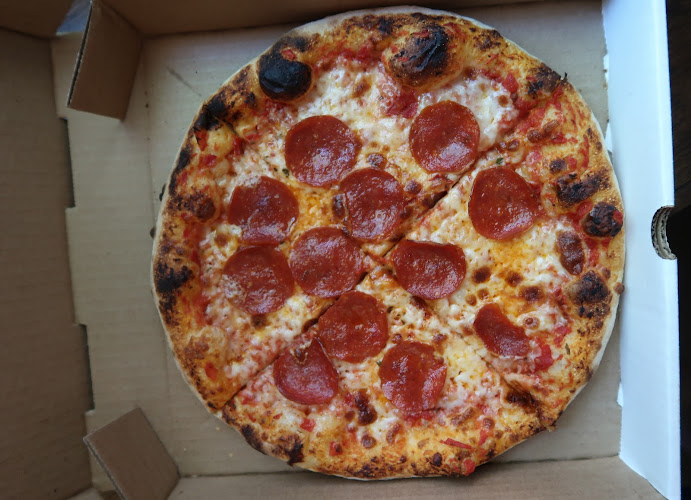 #1 best pizza place in Bellevue - In Pizza We Crust