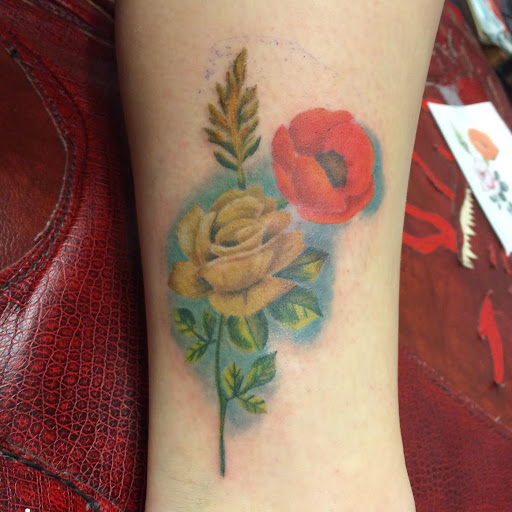 Explore dogwood tree tattoo ideas, creative tattoo ideas in Sioux Falls, available at Permanent Addictions