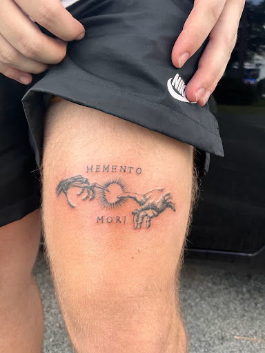 Explore minimalist tattoo ideas with meaning, creative tattoo ideas in Foley, available at Symbolic Ink Tattoo Studio