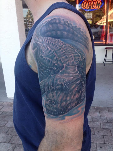 Explore roses tattoo ideas, creative tattoo ideas in Jacksonville, available at Electric Legacy Tattoo