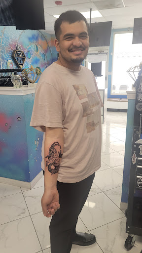 Explore cupid tattoo ideas, creative tattoo ideas in Murrieta, available at Diamond City Tattoo & Piercing
