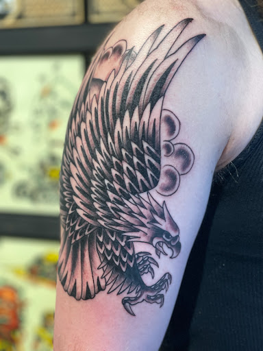 Explore forearm dragon tattoo ideas, creative tattoo ideas in Charlottesville, available at Have Heart Tattoo