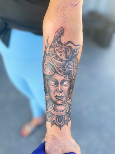 Explore jesus sleeve tattoo ideas, creative tattoo ideas in Myrtle Beach, available at Elite Ink Tattoos of Myrtle Beach