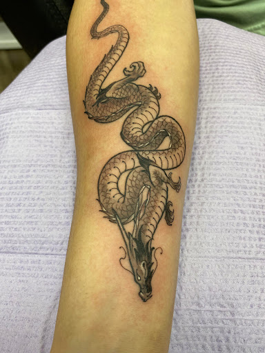 Explore lotr tattoo ideas, creative tattoo ideas in Largo, available at Alchemy Tattoos and Body Piercings