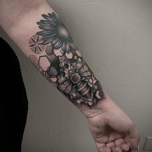 Explore tattoo ideas for breast cancer ribbon, creative tattoo ideas in Oklahoma City, available at Oklahoma Tattoo Collective