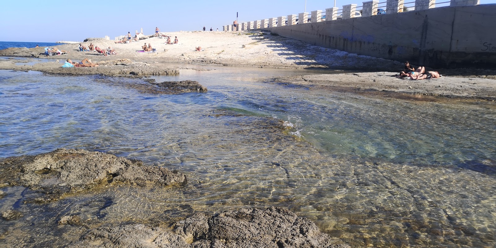 Valokuva Spiaggia Il Crocifissoista. puhtaustasolla korkea
