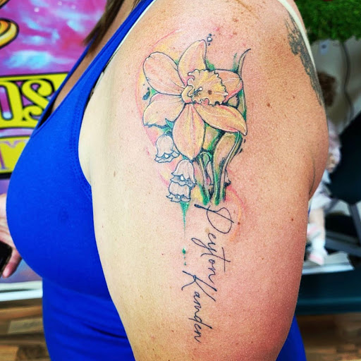Explore ampersand tattoo ideas, creative tattoo ideas in Kenosha, available at Kenosha Tattoo Company
