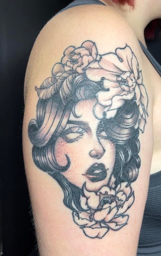 Explore hand tattoo ideas for men, creative tattoo ideas in Omaha, available at Villains Black