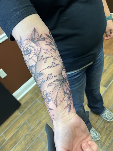 Explore watercolor flower tattoo ideas, creative tattoo ideas in Hinesville, available at Dark Horse Art Studios