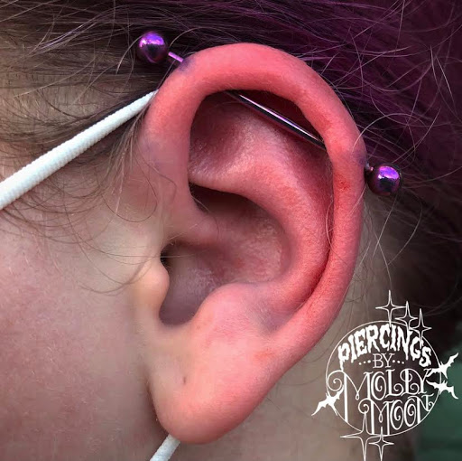 Explore spring tattoo ideas, creative tattoo ideas in Oshkosh, available at Piercings by Molly Moon at 920 Tattoo and Piercing