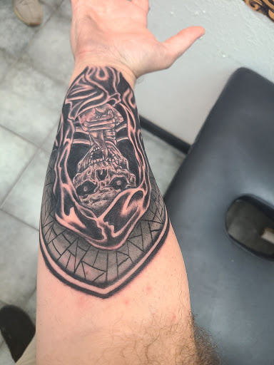 Explore lamb tattoo ideas, creative tattoo ideas in Altamonte Springs, available at Ink Spot Tattoo - Altamonte Springs