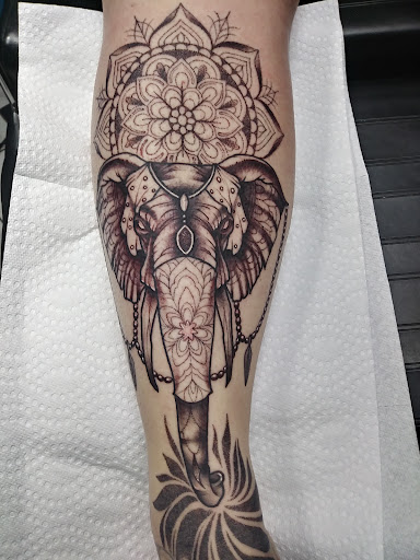 Explore november birth flower tattoo ideas, creative tattoo ideas in Indianapolis, available at Artistic Skin Design and Body Piercing