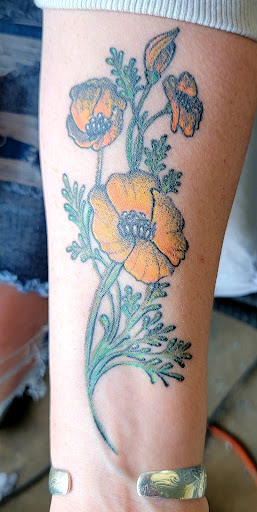 Explore womens sternum tattoo ideas, creative tattoo ideas in Redding, available at Blessed Ink