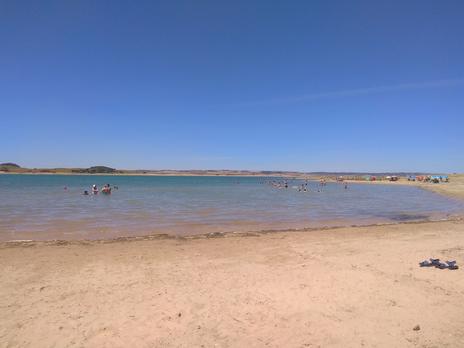 Fotografie cu Playa Manchamar cu o suprafață de nisip strălucitor