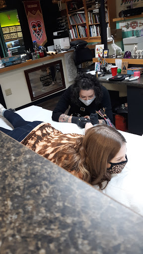 Explore thistle tattoo ideas, creative tattoo ideas in Little Rock, available at Seventh Street Tattoos & Piercing