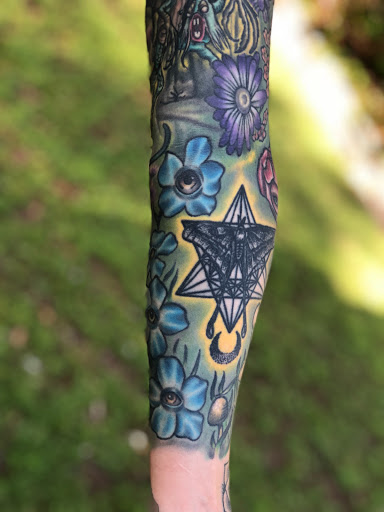 Explore cool neck tattoo ideas, creative tattoo ideas in Jacksonville, available at Electric Legacy Tattoo