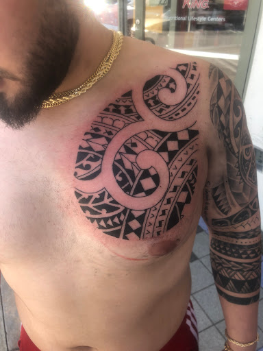 Explore zebra tattoo ideas, creative tattoo ideas in Miami, available at Almost Famous Tattoo Parlour