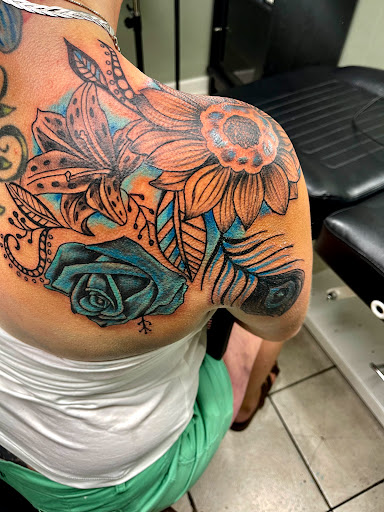 Explore stomach tattoo ideas for women, creative tattoo ideas in Gadsden, available at Zekez Inkz Tattoos & Piercings