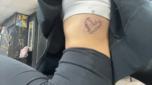 Explore little brother tattoo ideas, creative tattoo ideas in Derwood, available at Elevate Tattoo Studio (ETS)