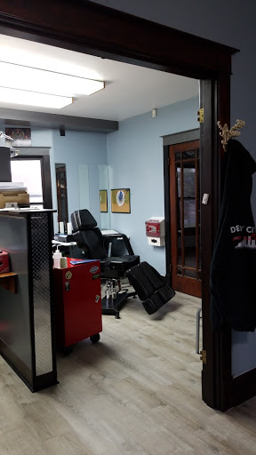 Explore pistol tattoo ideas, creative tattoo ideas in Louisville, available at Creative Ink Tattoo Studio