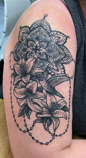 Explore love tattoo ideas, creative tattoo ideas in La Crosse, available at Nickel & Brass Tattoo Collective