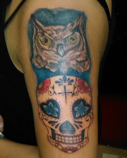 Explore simple spine tattoo ideas, creative tattoo ideas in Los Angeles, available at South Central Tattoos
