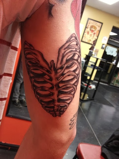 Find lock and key tattoo ideas for your next unique tattoo in Tiffin at Red Raven Tattoo & Art Gallery