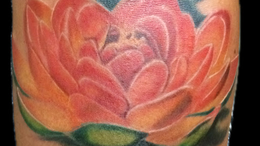 Explore skull neck tattoo ideas, creative tattoo ideas in Chapel Hill, available at Golden Falcon Tattoo and Piercing