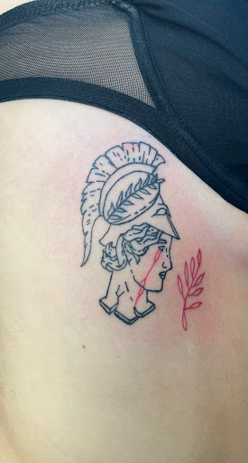 Explore gunslinger tattoo ideas, creative tattoo ideas in Alfred, available at Tattooed Spirit