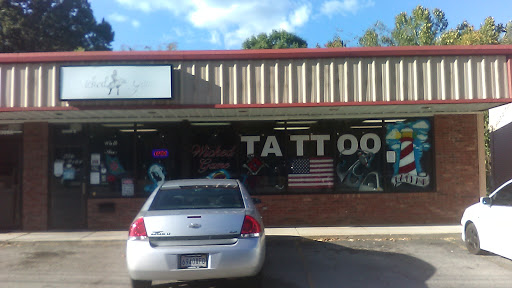 Explore cerebral palsy tattoo ideas, creative tattoo ideas in Anniston, available at Wicked Game Tattoo & Piercing Studio