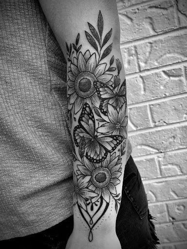Explore rising sun tattoo ideas, creative tattoo ideas in Terre Haute, available at Timeless Tattoo LLC