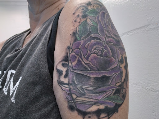 Explore boxer tattoo ideas, creative tattoo ideas in Ocala, available at Black Lotus Tattoo & Art Gallery Inc