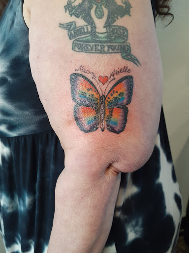 Explore august birth flower tattoo ideas, creative tattoo ideas in Long Beach, available at Broadway Tattoo and Piercing