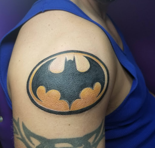Explore chest tattoo ideas for guys, creative tattoo ideas in Easley, available at Peach Pit Tattoo