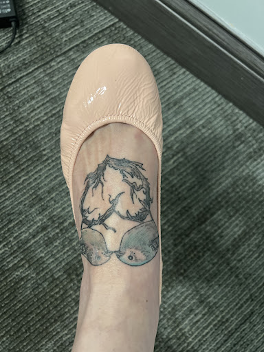 Explore literary tattoo ideas, creative tattoo ideas in Springfield, available at Poke and a Rub art studio