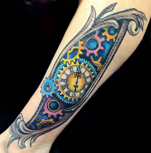 Explore back forearm tattoo ideas, creative tattoo ideas in Topeka, available at Looking Glass Tattoo & Gallery