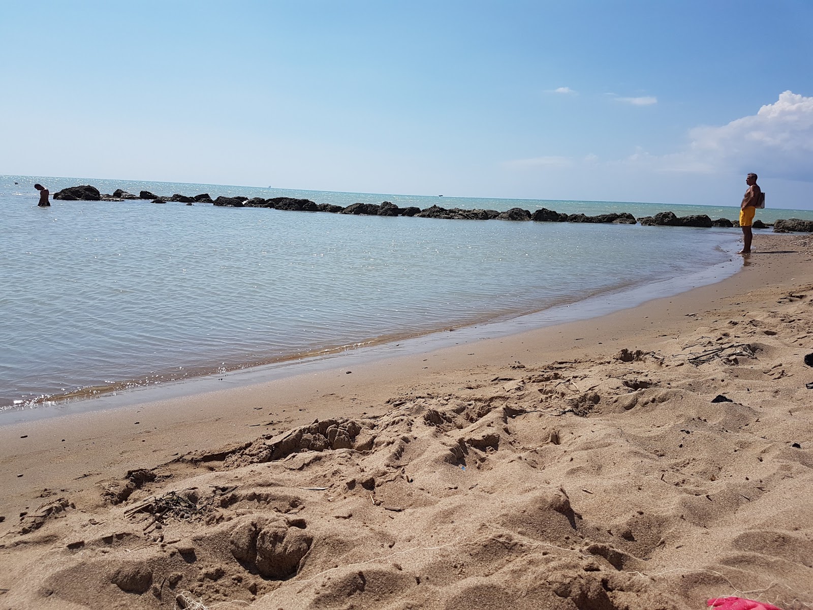 Fotografie cu Insonnia beach - locul popular printre cunoscătorii de relaxare