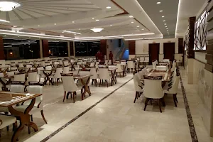 Al-Bustan Restaurants image