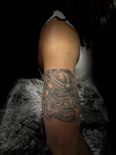 Explore dark tattoos ideas, creative tattoo ideas in Mattapan, available at Famous Touch Tattoos