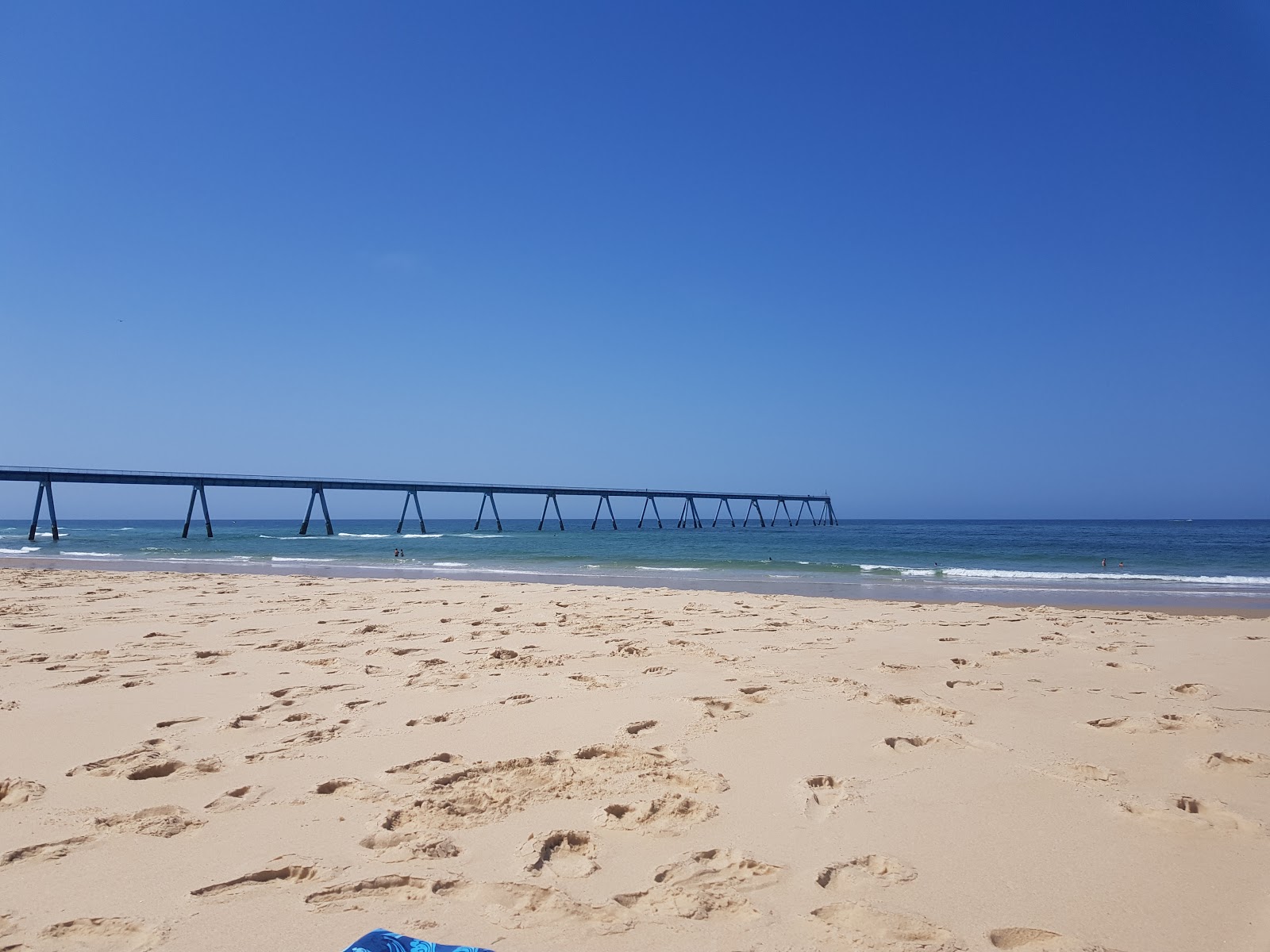 Fotografie cu Plage de la Salie Nord cu o suprafață de apa pură turcoaz