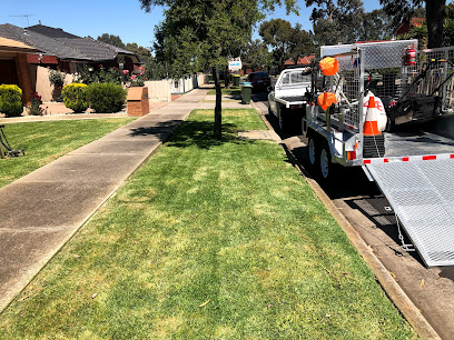 Grass Busters Mowing Service