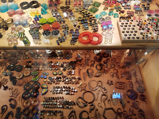 Explore word tattoo ideas for women, creative tattoo ideas in Atlanta, available at Kolo Piercing and Body Arts