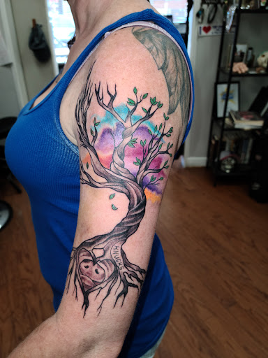 Explore skull and rose tattoo ideas, creative tattoo ideas in Greenville, available at Main Street Tattoo On Woodruff