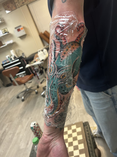 Explore sun and moon tattoo ideas, creative tattoo ideas in Omaha, available at The Brig Tattoo Parlor