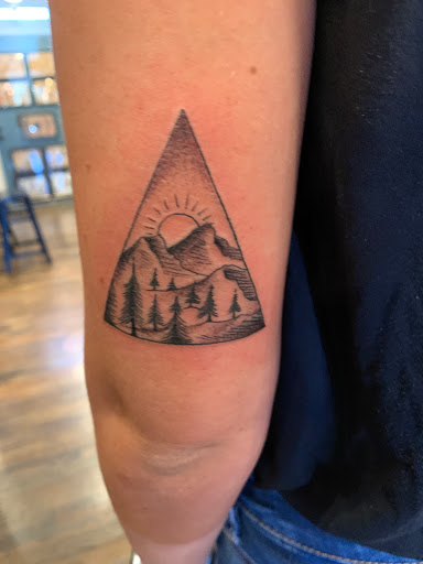 Explore leg tattoo ideas woman, creative tattoo ideas in Oceanside, available at The Arcade Oceanside Tattoo
